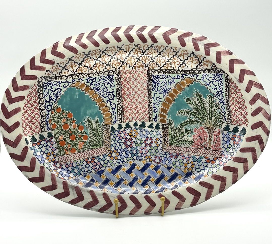 A handbuilt platter  depicting various tile patterns  inspired by the Al-Hambra Palace  Spain.