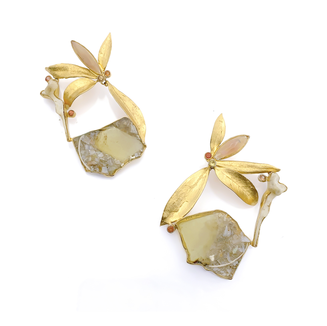 Wello opal  opposum vertebra  mouse ribs  orange sapphires  amber  18k yellow gold over silver. Lost wax cast and fabricated.