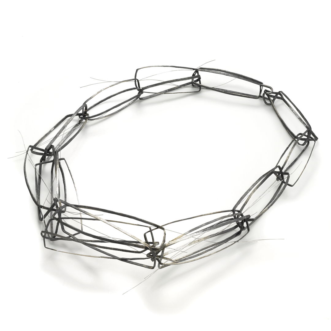 Necklace Sterling silver oxidized with nylon coated steel wire Constructed.