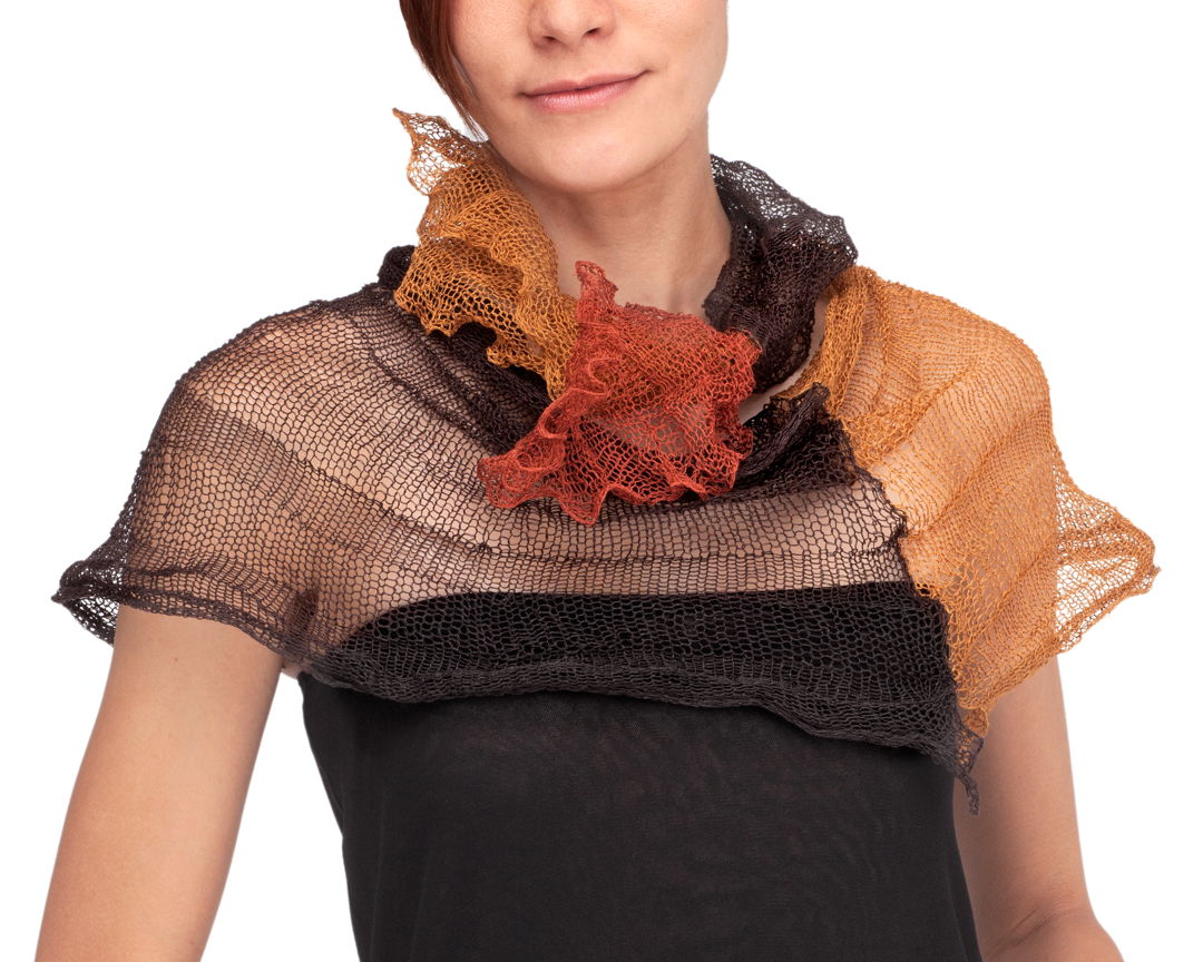 Shawl and scarf knit with silk stainless steel thread.