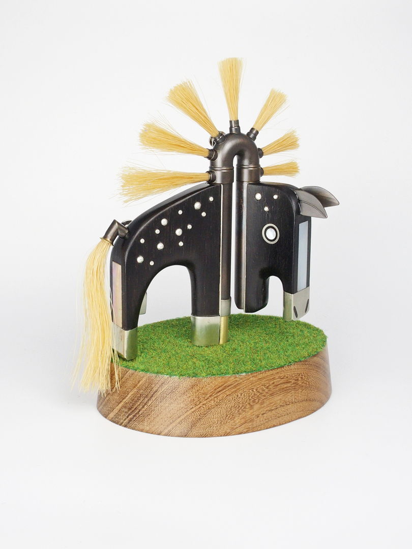 Free standing object with removable brooch/necklace (5.5 x 5.5"). The head pivots.