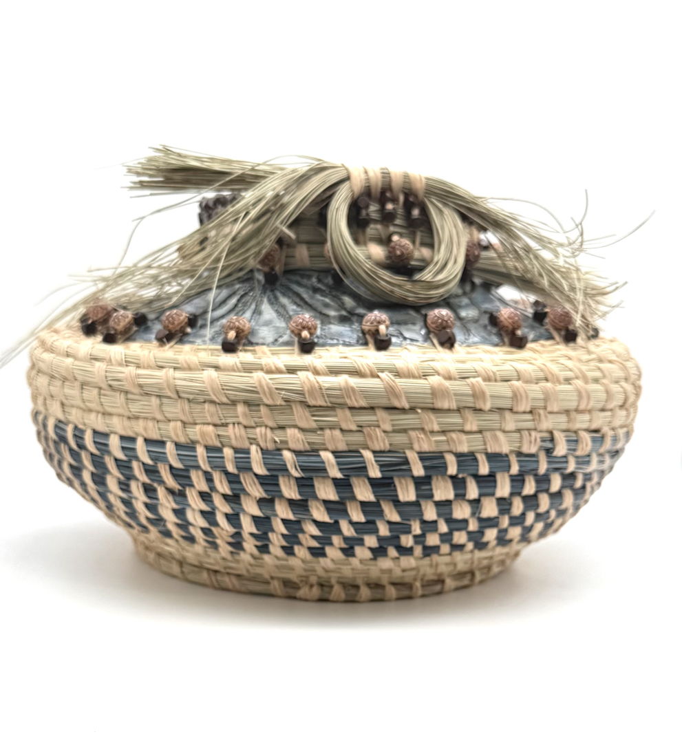 Hand built pottery inlay embrace with sweetgrass sewn onto ceramic insert creating a wonderful balance to both art form. Note*: This piece has been sewn meticulously together without any glue or adhesive.