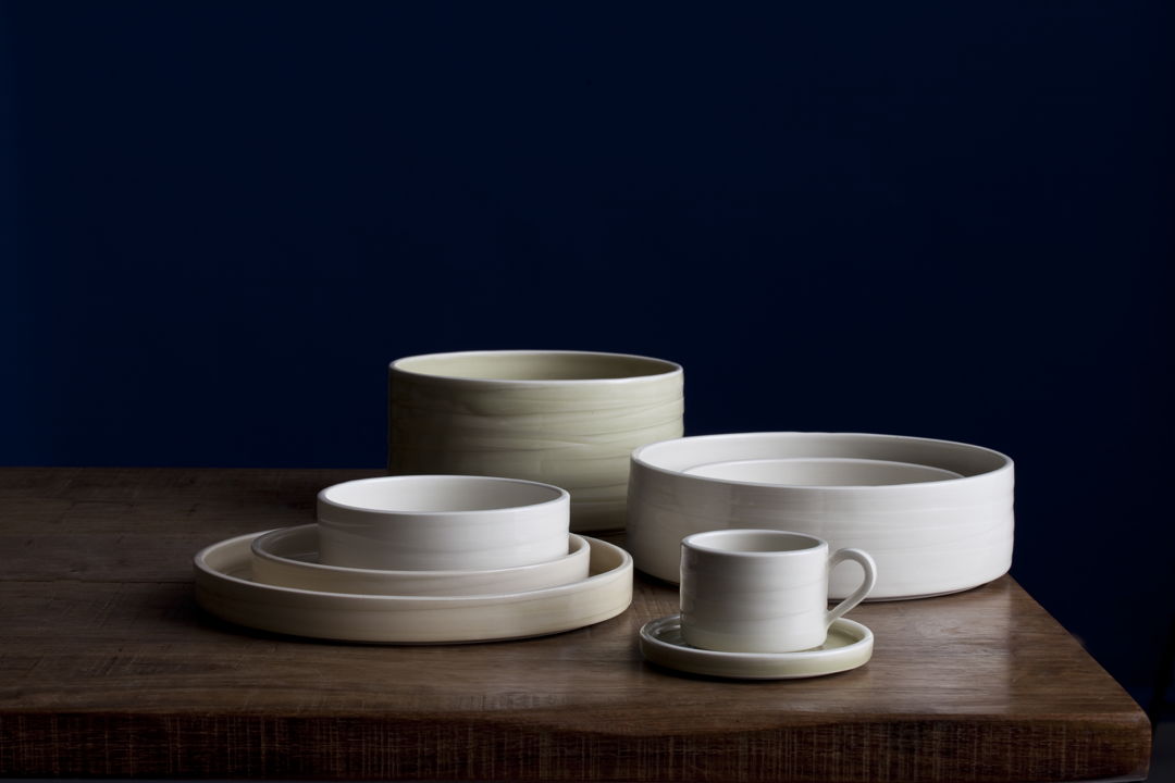 Sturdy cylindrical shaped ware hand thrown from porcelaneous clay. The dimensions and price are for a single dinner plate.