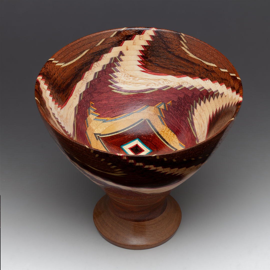 Merlin's Bowl has magic in it. 720 individual pieces wood wood  Satine  Yellowheart  Purpleheart  Ash  Pau Ferro  Walnut  artist dyed Maple veneers