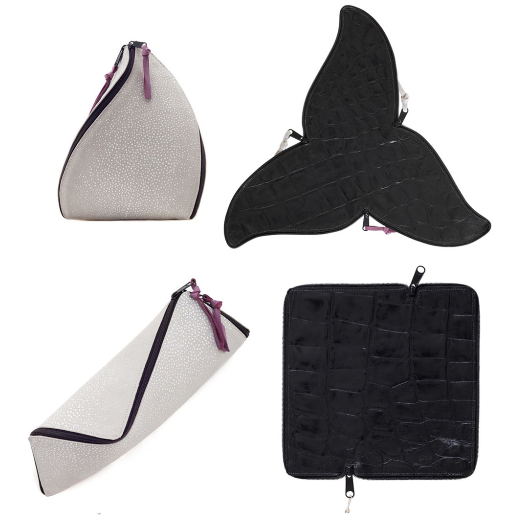 Original patterning technique zips flat for travel or storage. Leathers.