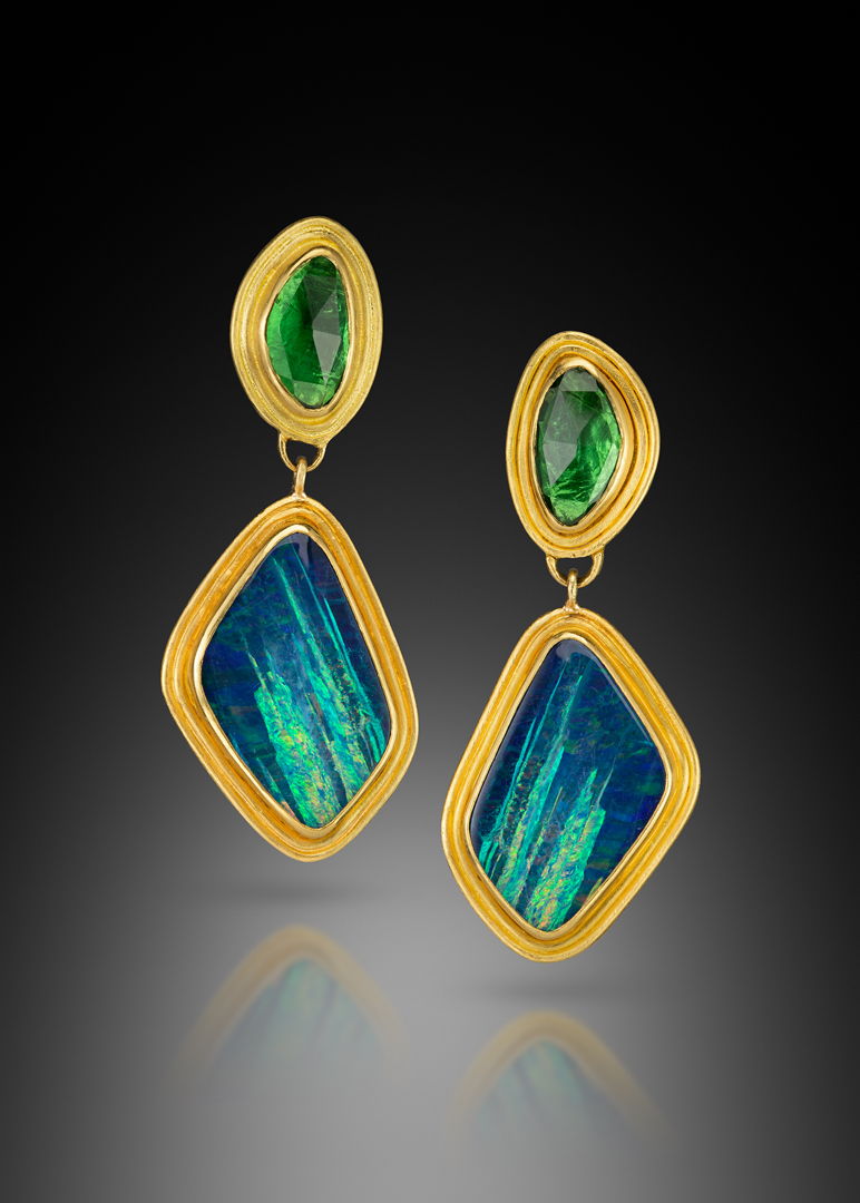 Earrings  hand fabricated  fused  with 22k gold. Set with a pair of Australian opals and rose cut tsavorite garnets.