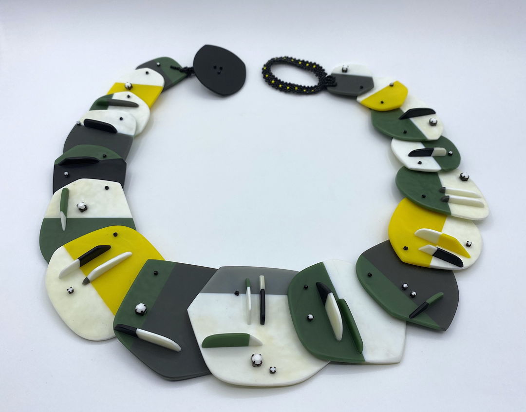 Fused and carved glass with rhinestones and glass seed beads