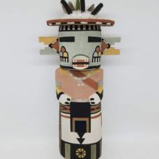 The Cloud Kachina is a symbol of all the different colored clouds that come from the four cardinal directions  he is also a symbol of moisture. the Cloud Kachina is carved out of dried aged cottonwood root  painted with natural earth mineral paints that I hand collect and process myself. Parrot feathers and natural cotton is used to complete the Cloud Kachina.