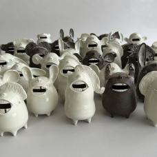 Coin banks. The hole to insert the coins is the mouth of the creature.