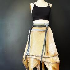 Golden sateen with upcycled denim and a multidimensional handkerchief hem wrap skirt. One size fits all.