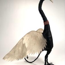 Leather Avian with pierced rawhide wings  antler tip beak  extensive hand beading and stitching. Flexible wings