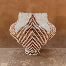 Radiating star design made out of metallic paper. Over 4500 pieces of paper was used to construct this piece