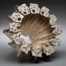 Porcelain  wheel thrown  hand formed  pinched  pierced  immersed in the Nubanusit River for 2 months