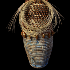 Wheel thrown vessels South Carolina sweetgrass  and bulrush. Wooden beads are used to offer variation and contrast.