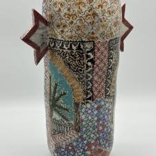 Hand painted  wheel thrown vase with various patterns  inspired by an archway scene from the Al-Hambra Palace in Spain.