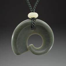Jade necklace featuring a pendant I carved in sage/olive green Wyoming jade  accented by Hetian jade beads and silk kumihimo cord.