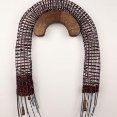 Wall-hanging sculpture. Walnut wood  dyed reed  waxed thread  brass hardware