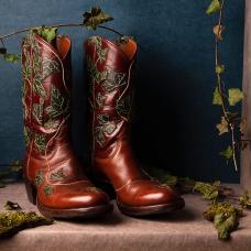 Bespoke boots that explore the idea of boots as architecture. Each leaf is hand-embroidered in silk thread.