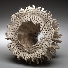 Porcelain  wheel thrown  hand formed  pinched  pierced  high fired  immersed in the Nubanusit River for two months