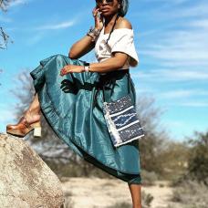 Lightweight teal colored silk wrap skirt with upcycled denim and Kantha pocket. Leather ties. One size fits all.