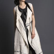 Hand-dyed shibori using sustainable dyes and linen. Deconstructed  pieced  stitched. Hand-patterned.