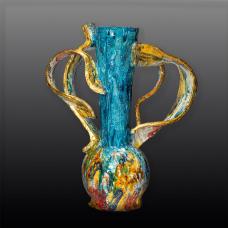Handformed earthenware vessel sculpture created using a series of slumped forms parts of which are manipulated assembled into one of a kind artworks multifired for desired glaze effect and density