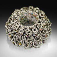 Recycled New York Times newspaper Headlines  News Text  Headline Color Images  and Headline Black &amp;amp; White images are hand-formed into beads and hand-stitched together into the form of a bracelet. 2022