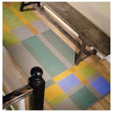 Contemporary rag rug handwoven with 100% cotton yarn and fabric strips using the Double Weave technique