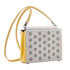 The paris purse is hand fabricated in etched stainless steel with leather gussets and a detachable leather shoulder strap.