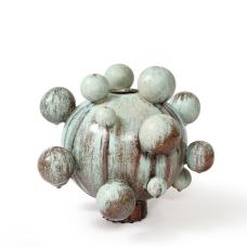 Imagined soft star form that feels like a natural object and a formal sculpture.Large soda fired vessel with soft ball extensions. Blue and brown matte crystals  with streaks of turquoise.