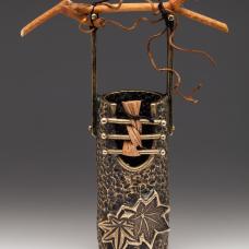One of a kind lost wax cast bronze with woven sweet grass  grapevine and silk.