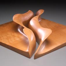 Tectonic is composed of 2 movable pieces carved from madrone.