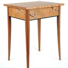 Solid cherry side table featuring veneer marquetry depicting the branches and flowers of a Japanese cherry blossom tree.