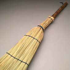 Locally harvested dogwood handle with natural dyed indigo cordage and plated broomcorn broom.