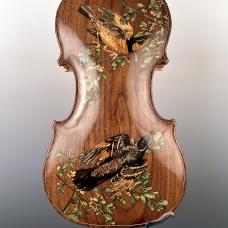 Traditionally handmade violin featuring a mockingbird motif I designed and inlayed by hand. 