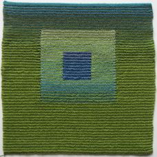 knitted square depicting three layers of color gradient