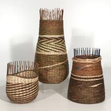 Natural baskets woven using a locally-gathered  invasive vine called akebia.