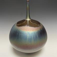 high fired porcelain with Blue hare's fur glaze.