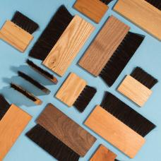 Small solid wood brushes with staple set horsehair bristles.