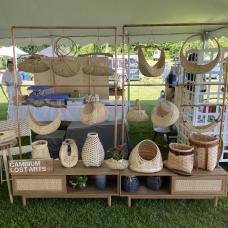This is an example of a small  8 booth display employing vintage furniture, birch plinths  and copper racks to display my baskets.