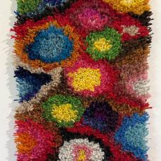 Handwoven backing of linen and wool. Hand knotted wool. Cut pile. To hang on the wall or use as a rug.