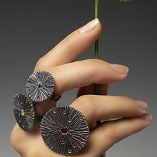 Oxidized silver shield rings with rubies or sapphires