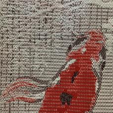 detail of woven image of koi