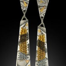 mixed metal earrings with geometric motif