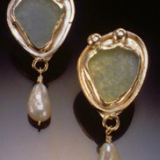 two earrings with teardrop accent