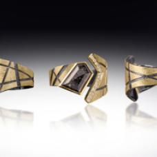 This piece is entirely hand fabricated using sterling silver and 18k gold and set with black drusy and black diamonds
