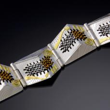 silver, gold, and rust jewelry