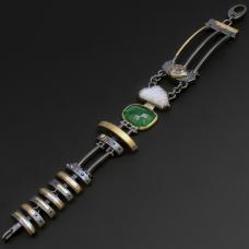 silver, gold, green, and white bracelet