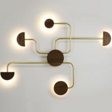 lamp with five light sources emerging from a central circle