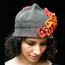 Wet felted pewter gray cloche w/ Nasturtiums in 4 shades of orange cascading down one side. 5 of the flowers hold pale green Turquoise beads. Freehand machine embroidery in a vine pattern border the flowers. Finished with a cotton/rayon sweatband inside